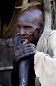 With help from George, the local warden, I “interviewed” this Tugan elder. Many flamingos (Orit) on his Lk. Bogoria means there will be water for his crops and livestock. He uses the long flamingo leg tendon as a bow string. Kenya, Lk. Bogoria. Tugan elder talking about flamingo “mythology.”