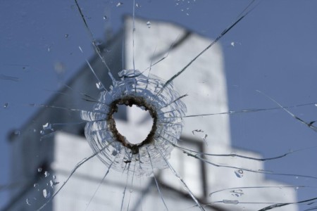 Fairfield, Idaho. International Harvester Scout window, grain silo. ID, Fairfield. Grain silo.