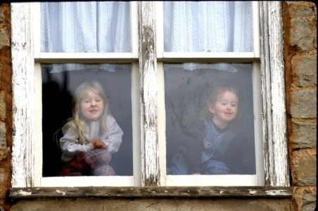 This was one of the most popular images in the book. I sent the kids into the attic of the Virgin, UT courthouse and had their mom, outside, hold their attention as I balanced on the roof of my truck and shot many frames. I had no idea this shot would be so popular. UT, Virgin. Mayor’s grandchildren.
